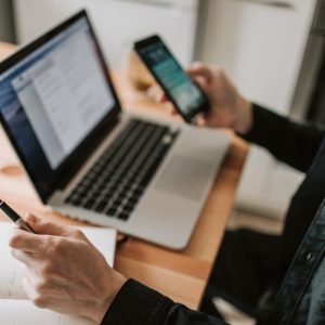 photo of person holding mobile phone